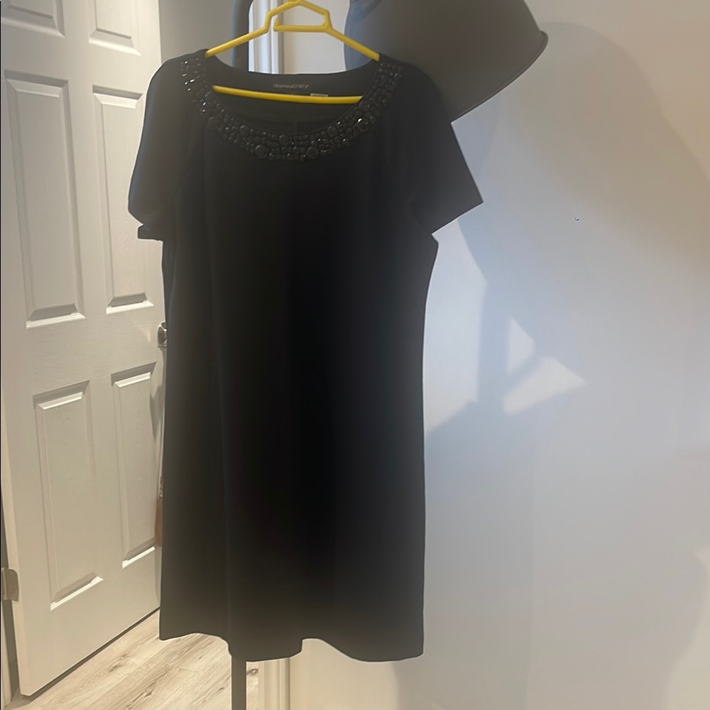 Elegant Black Dress with Embellished Neckline
